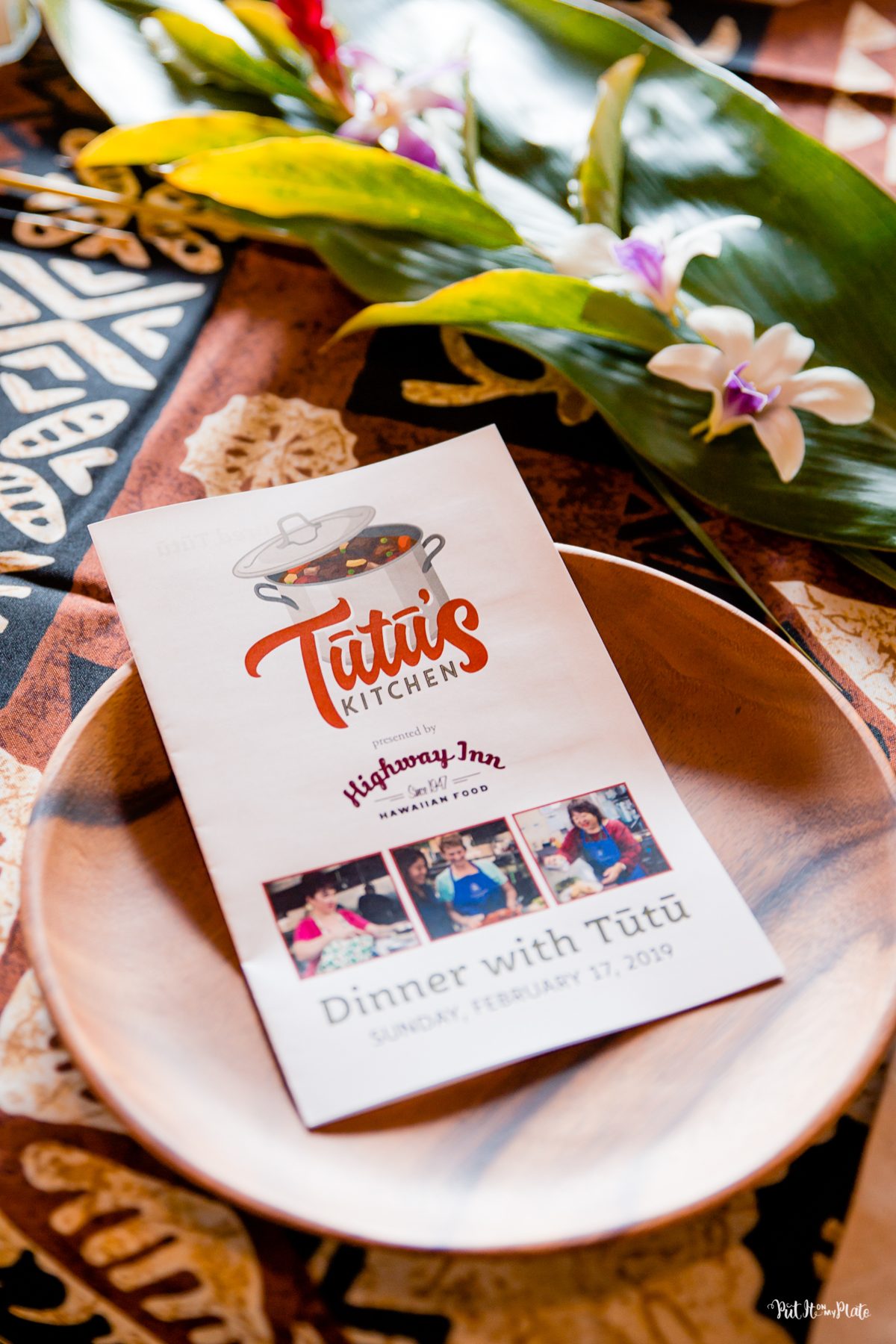 A program for Tutu's Kitchen on a wooden plate